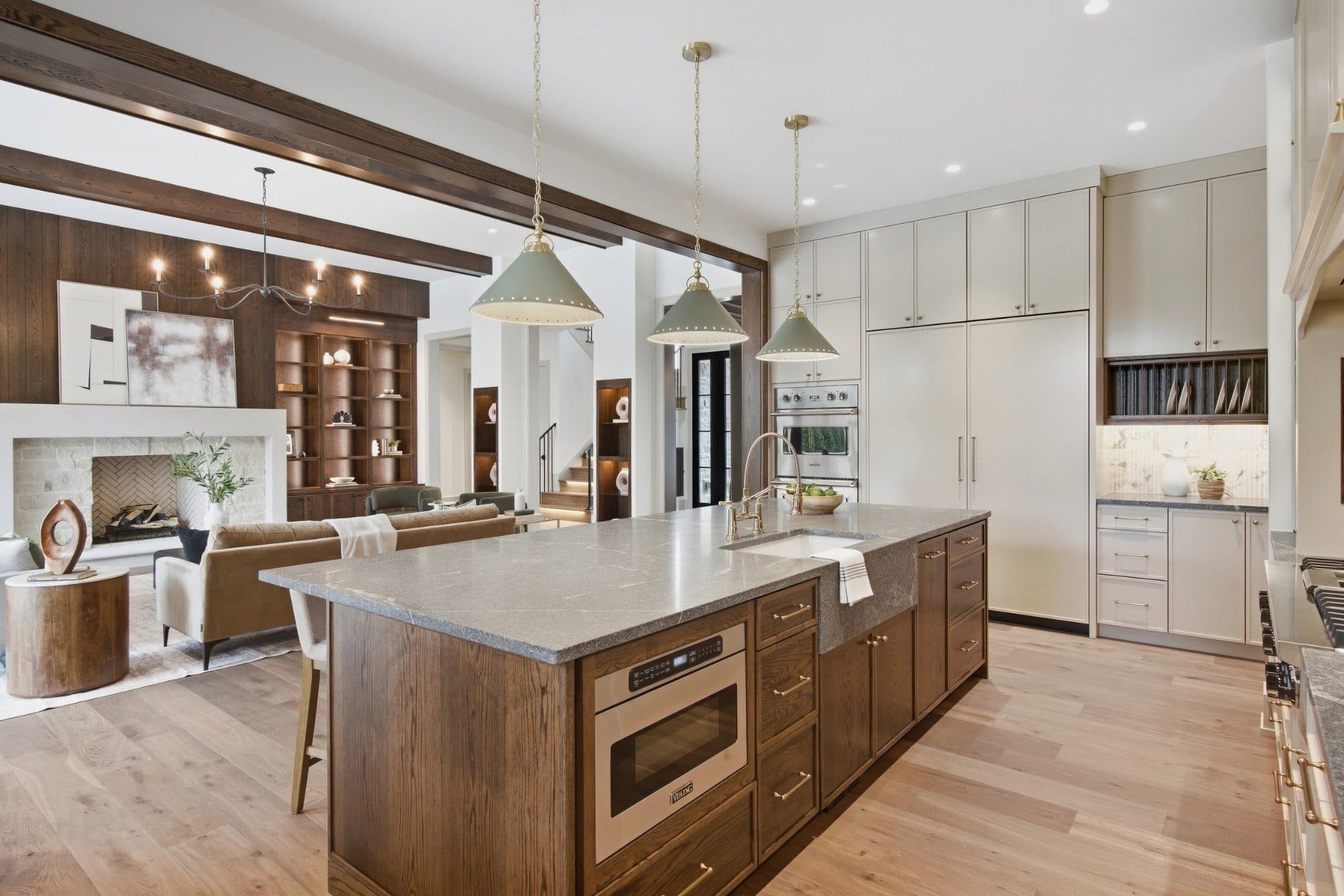 Kitchen with a large wood island, pendant lights, and custom cabinetry at 3720 Benham Ave, Green Hills Nashville
