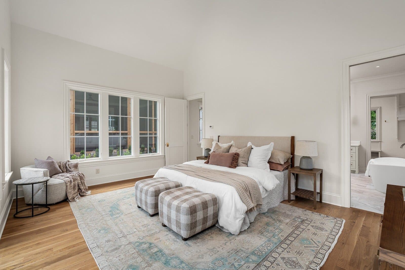 Primary bedroom with a wall of windows and natural light at 1113 Glenwood Ave, Green Hills Nashville