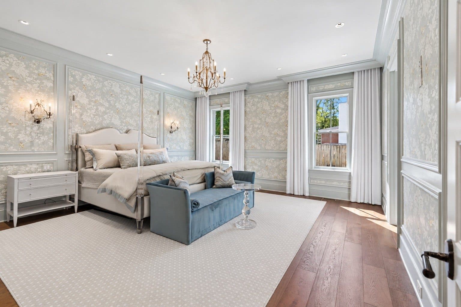 Primary bedroom with paneled walls, wallcovering, and a chandelier at 2301 Warfield Lane, Green Hills Nashville